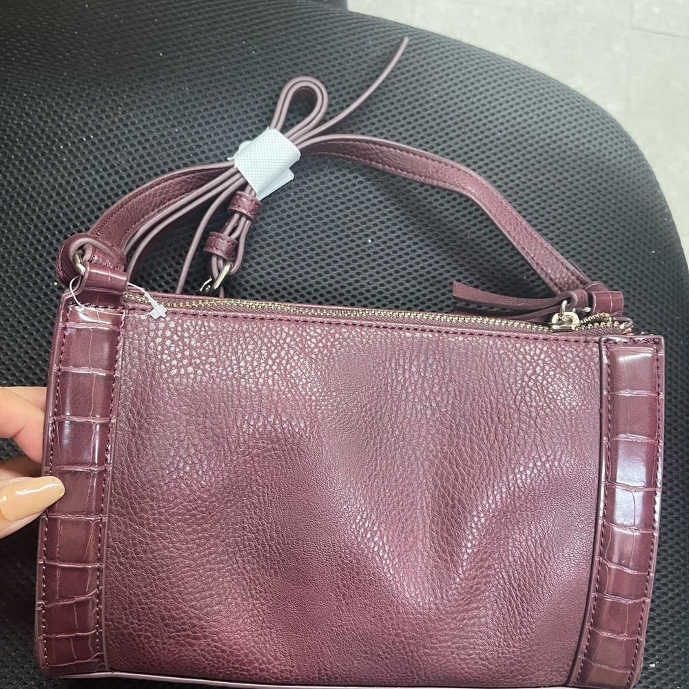 Market and spruce cross body